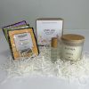 Candle, roll-on and spa tea in a bundled care pack